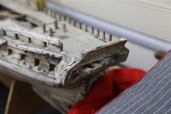 An 18th century wooden model of a thirty two gun Ship of The Line, length 3ft 2in.